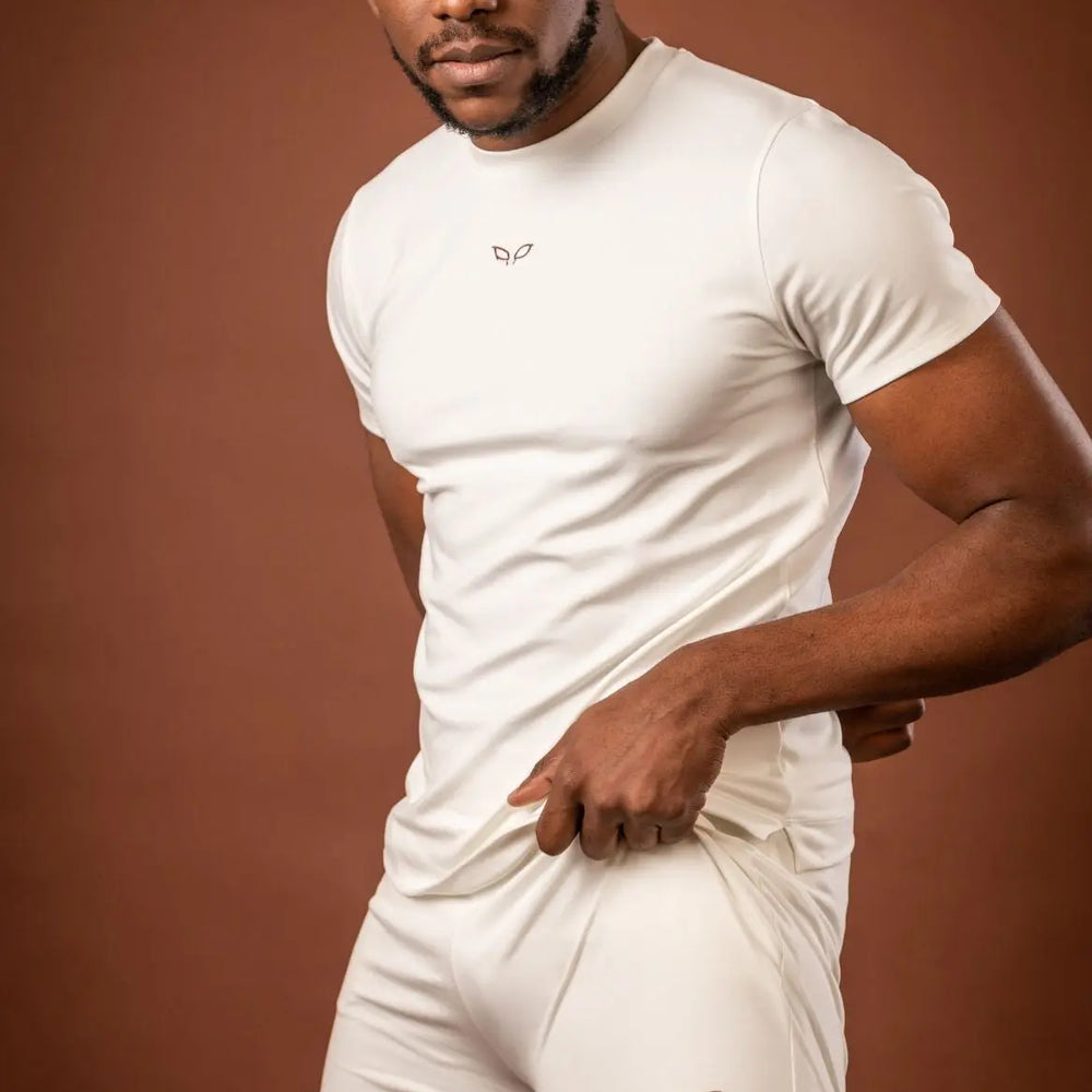 
                      
                        Amal t-shirt and Ergon shorts, a unisex sportswear and activewear symbiotic outfit made from sustainable and biosourced seaweed and wood fibers, with biodegradable elastane, free from toxic synthetics, eternal pollutants, and dyes, featuring the natural luminous color of the fibers in an off-white undyed shade.

                      
                    
